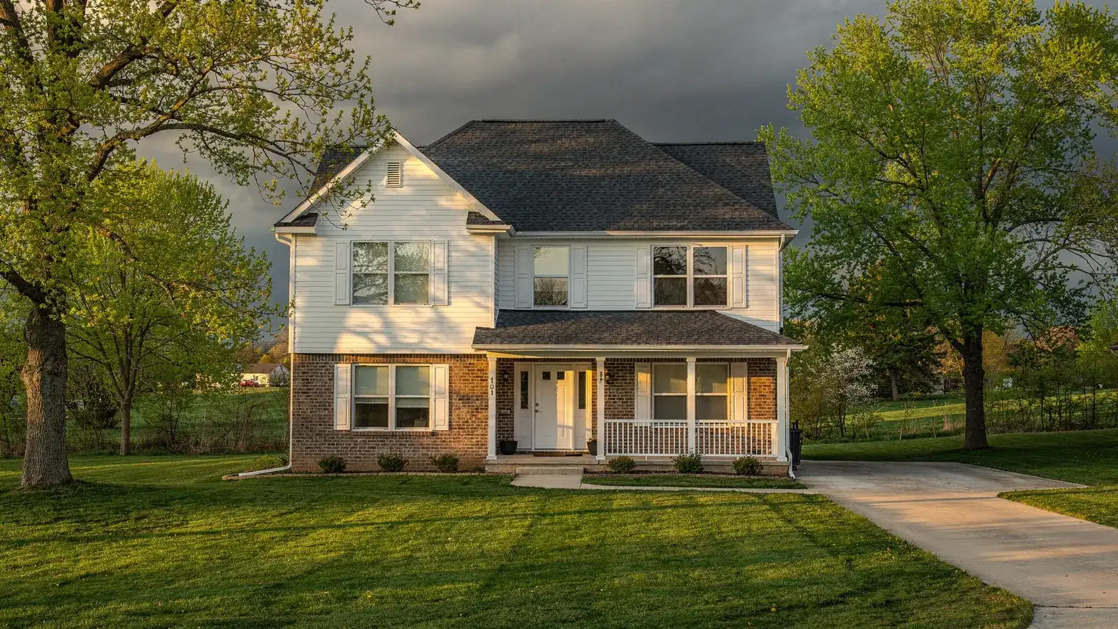 A mid Missouri home with a new shingle roof after a spring storm